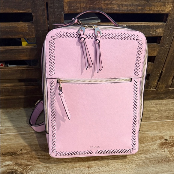 Calpak Handbags - Calpak Light Pink Backpack with Stitch Detail